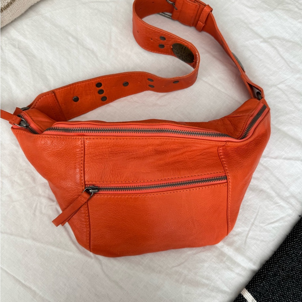 Free people wilder embellished sling bag in Orange Leather